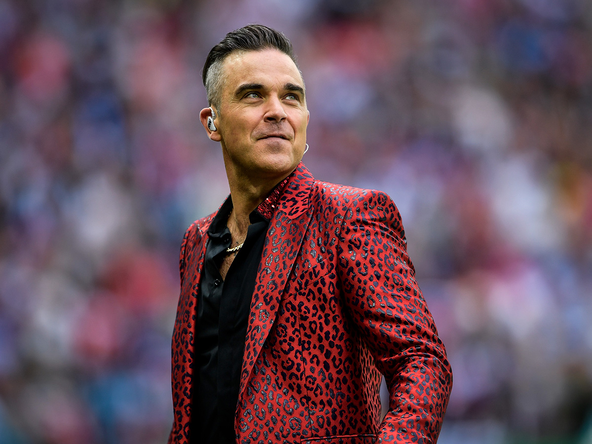 Robbie Williams devine ambasadorul muzical oficial FIFA și lansează imnul „Desire”